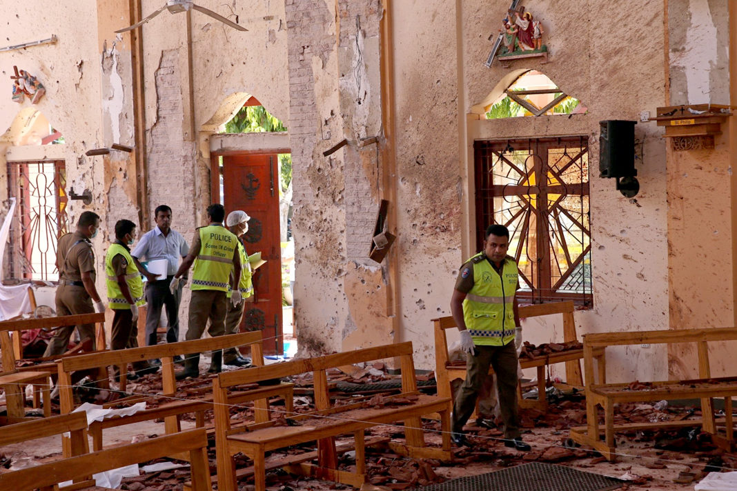 the-no-1-target-for-hate-attacks-105-churches-are-attacked-every-month Police officers work at the scene at St. Sebastian Catholic Church, after bomb blasts ripped through churches and luxury hotels on Easter, in Negombo, Sri Lanka. (REUTERS/Athit Perawongmetha)