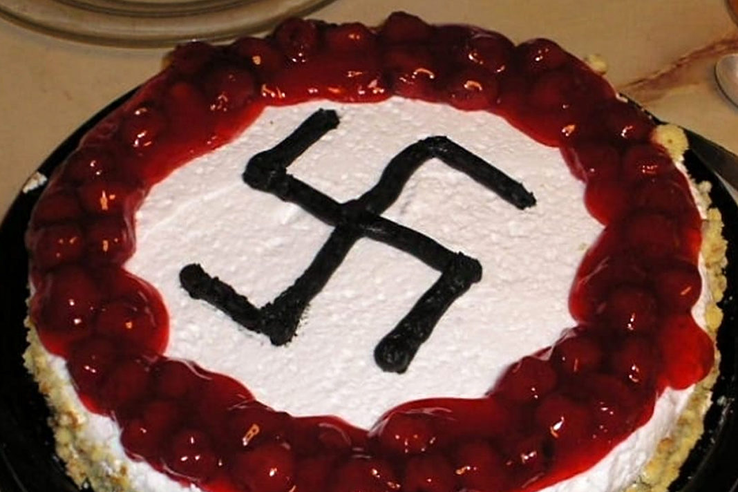 Djamel Boumaaz, an official in the French neighborhood of Montpelier, celebrated his 40th birthday with a swastika-decorated cake, July 2019. (Twitter)
