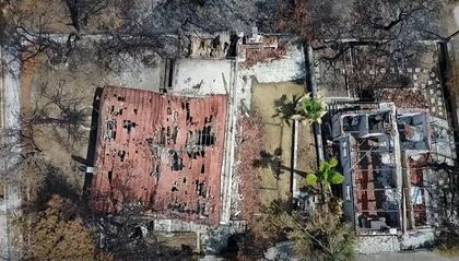 The wildfires killed 102 people and destroye hundreds od houses. / You Tube