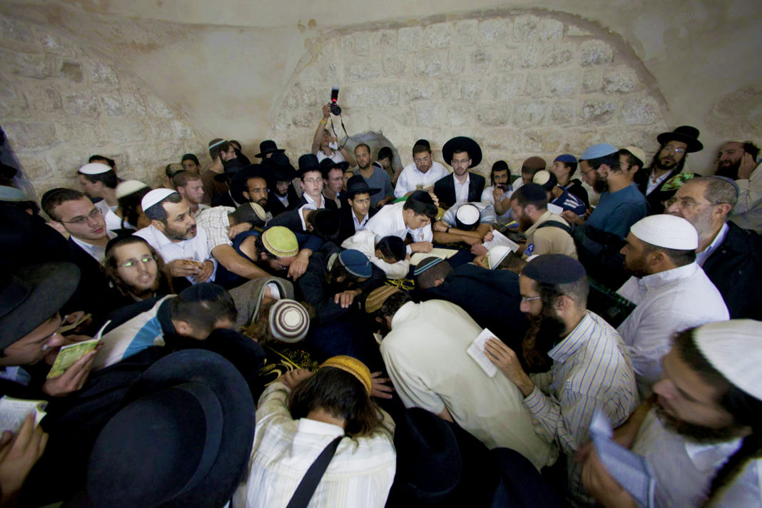 idf-neutralizes-pipe-bomb-at-josephs-tomb-before-1200-jewish-worshippers-arrive Jewish men pray at Joseph’s Tomb in Shechem/Nablus