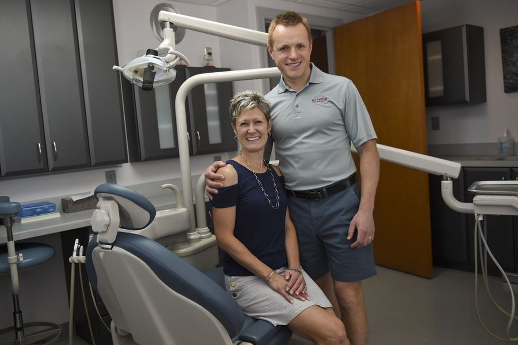 Ann and Tim Medianick in his dental practice, Boulevard Dental Associates in Reading, following their return from Ukraine where he provided dental care to orphans