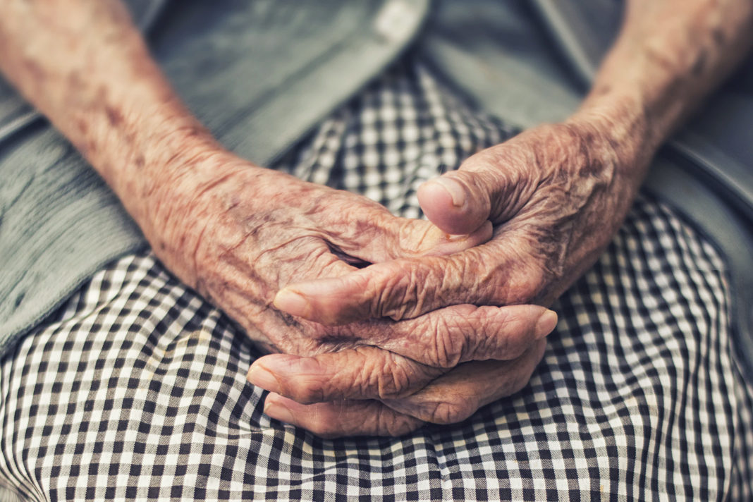 italian-courts-assisted-suicide-decision-a-step-towards-culture-of-death elderly woman sitting with hands folded
