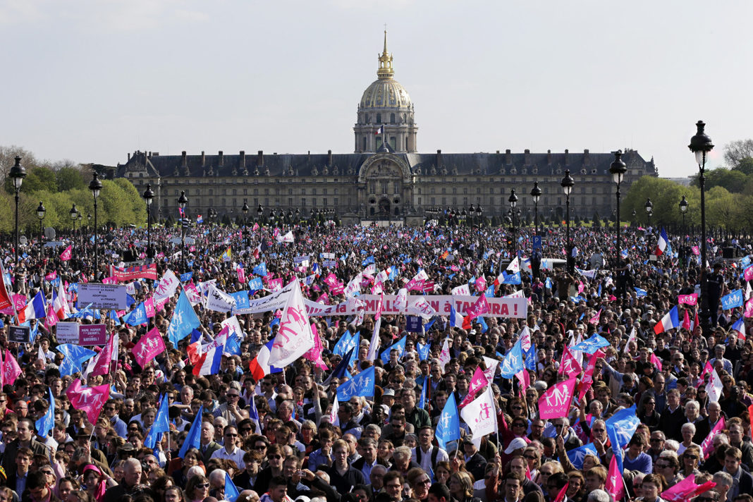 Tens of thousands march in Paris