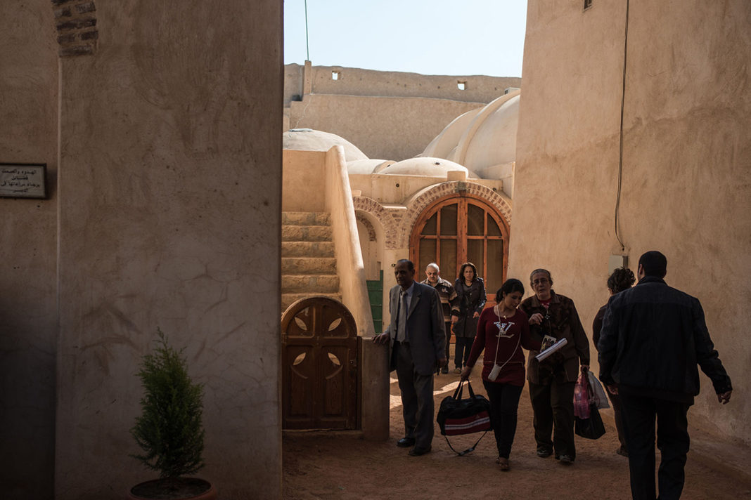 egyptian-christians-ordered-to-move-church Egyptian Coptic Christians walk inside the Syrian Monastery in Wadi EI Natrun, Beheira Province, Northwestern Egypt on March 7,2015./ Pan Chaoyue / Max PPP