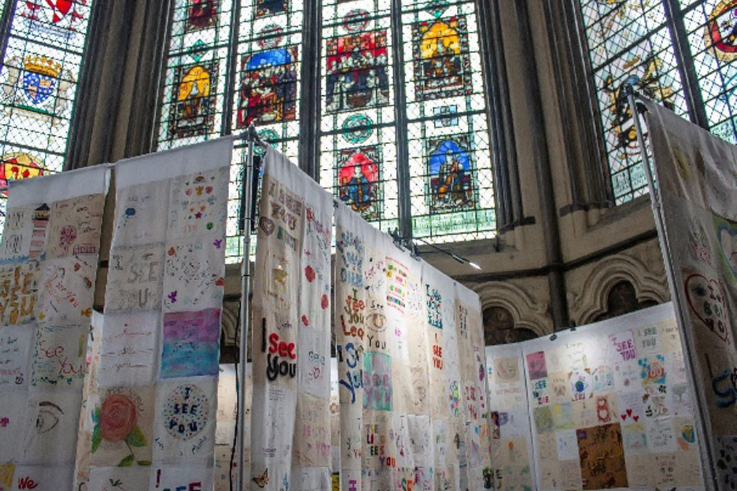i-see-you-a-handmade-petition-to-support-persecuted-christian-women 16,000 squares of fabric were held at Westminster Abbey ti support persecuted Christian women. / Open Doors UK.