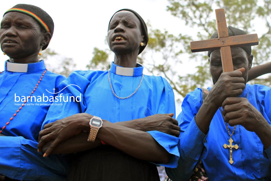sudanese-christians-promised-right-to-worship-freely-and-sharia-law-on-womens-dress-repealed A 2010 file photo shows Christians praying in Sudan