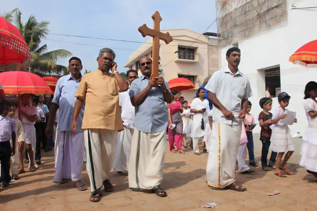 two-christian-pastors-have-been-martyred-in-india,-but-their-work-continues Unidentified devotees hold the holy cross on their head during the annual celebration of the Malankara Orthodox Church on November 2, 2010 in Parumala, Kerala, India.