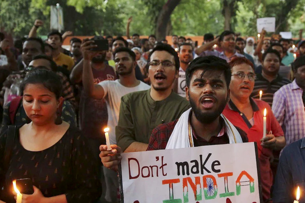 an-indian-pastors-response-to-rising-violence-against-muslims Indian protesters shout slogans as they hold placards and candles during a protest in New Delhi on June 26, 2019, condemning the recent mob lynching of a Muslim youth, Tabrez Ansari, in Jharkhand state. (AP Photo/Altaf Qadri)