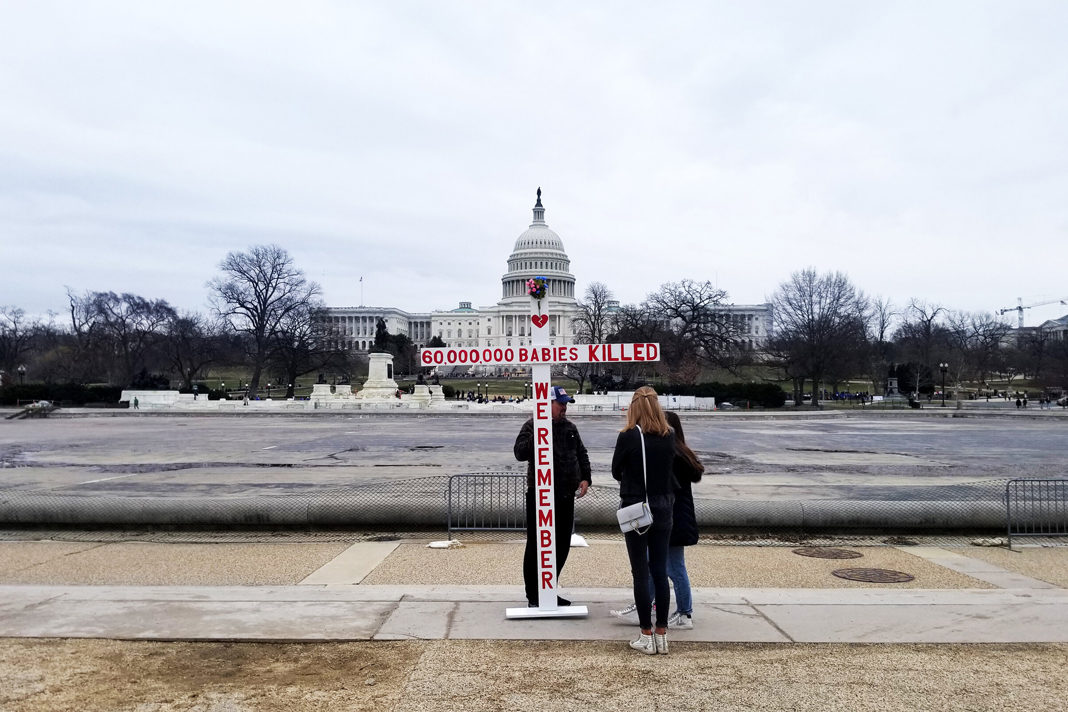 trump-becomes-first-u-s-president-to-attend-march-for-life A demonstrator picked a spot away from the throngs of people who attended the 47th annual March for Life on Jan. 24. Photo by Micah Danney.