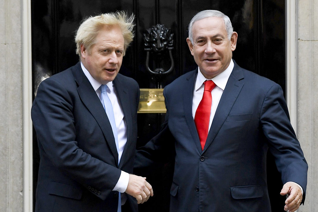 watch-british-pm-johnson-vows-to-stamp-out-anti-semitism British PM Boris Johnson (L) greets Israeli counterpart Benjamin Netanyahu in London, Sept. 5, 2019. (AP/Alberto Pezzali)