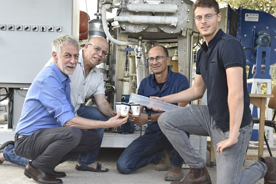 israeli-scientists-generate-water-from-air-even-in-the-desert Prof. David Broday (left), Prof. Eran Frielder and their team enjoy drinking water generated from the air. Photo courtesy of the Technion