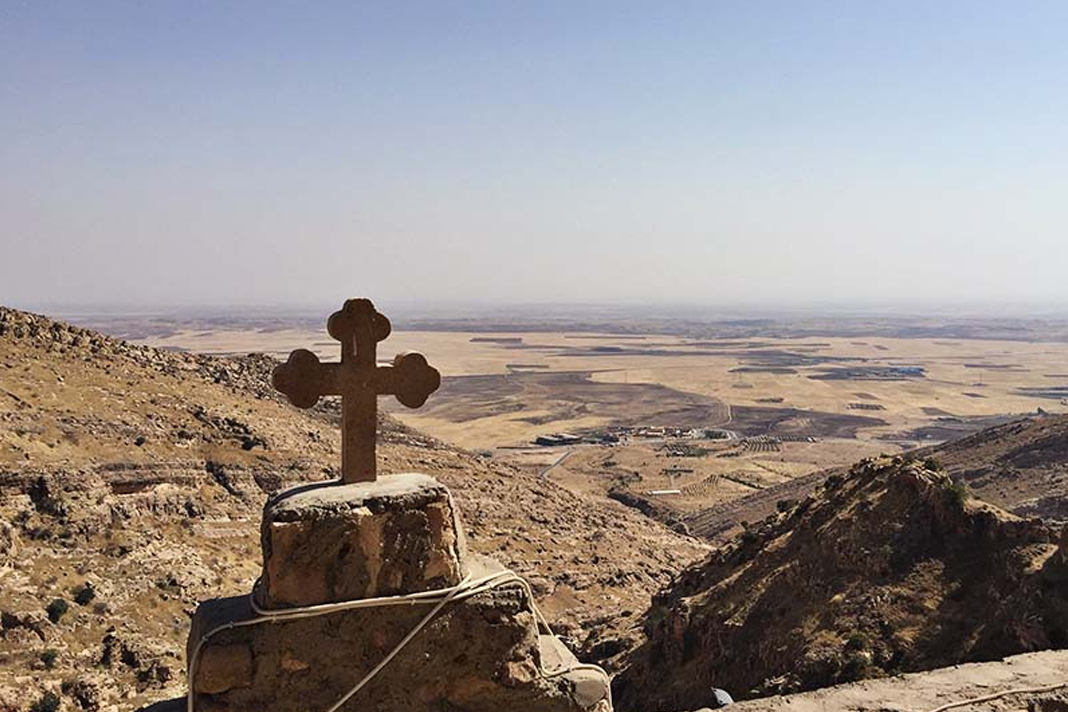 iraqis-faith-grows-as-churches-close Cross on a hill