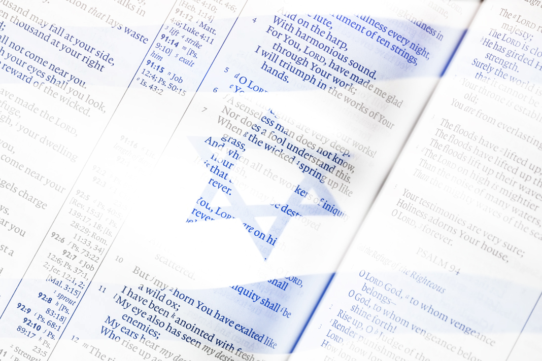 lutherans-publish-new-bible-version-that-omits-the-word-israel Israel flag with Bible