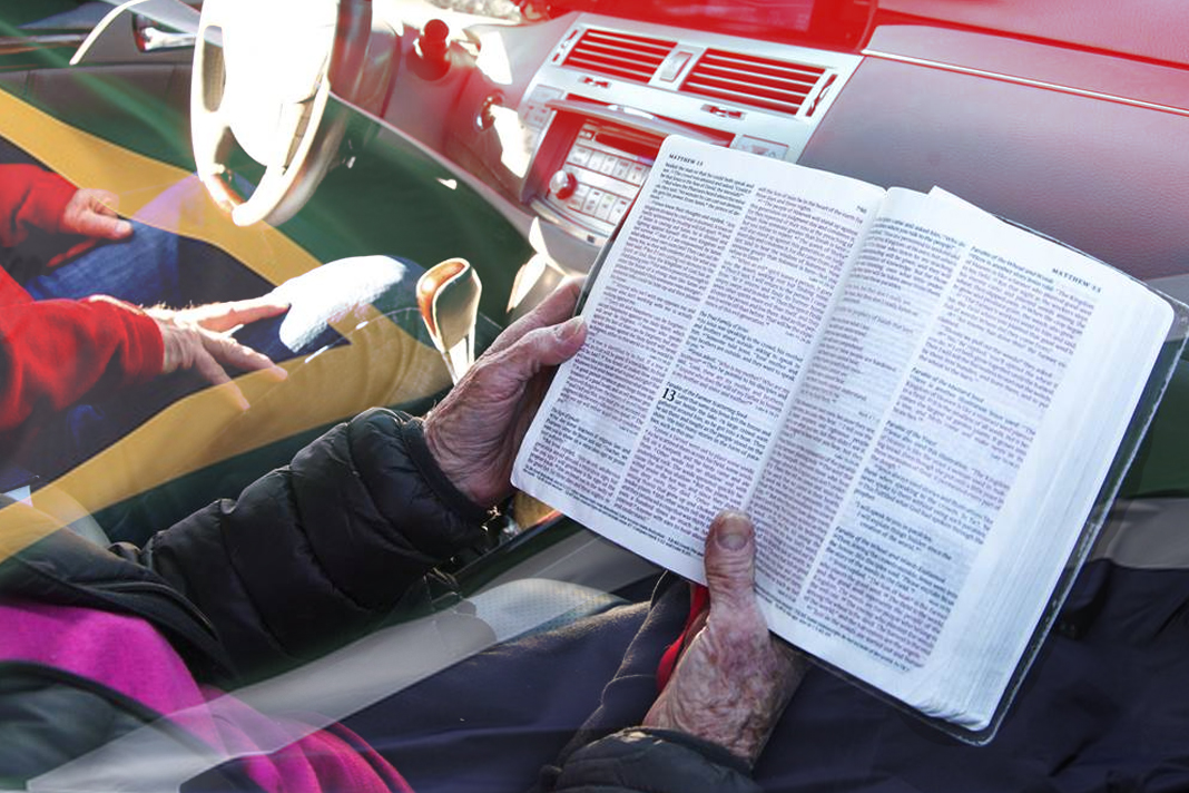 drive-in-services-highlight-lack-of-coherence-in-government-treatment-of-the-religious-community people reading Bible in car