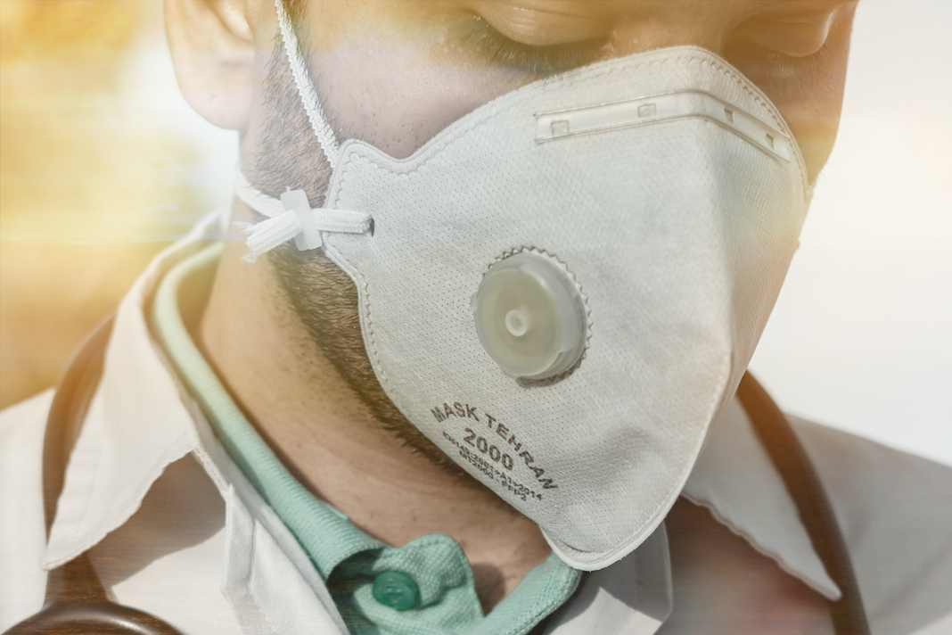 god-of-miracles-pastor-in-covid-coma-healed-after-doctor-turns-his-case-over-to-god Doctor with mask