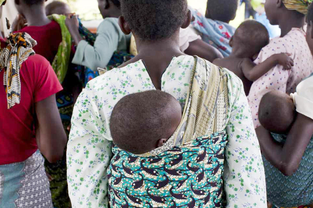 malawi-mps-stand-for-life-shout-no-when-asked-to-debate-expanding-abortion Woman with baby on her back
