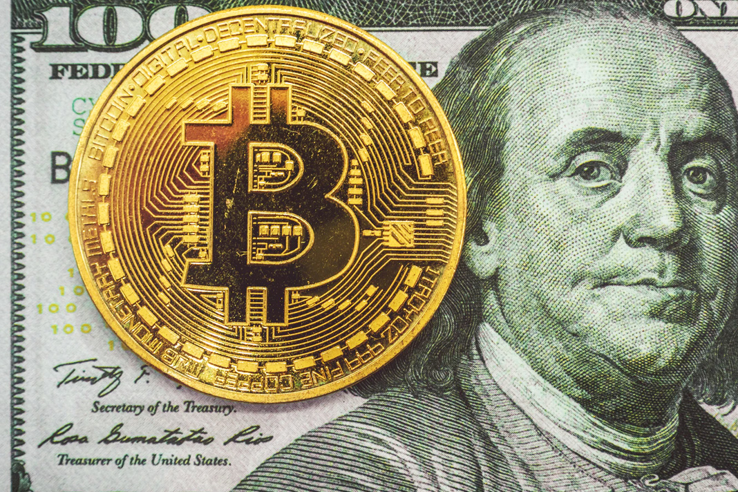 the-coming-global-enslavement-to-digital-currencies Bitcoin on hundred dollars bills