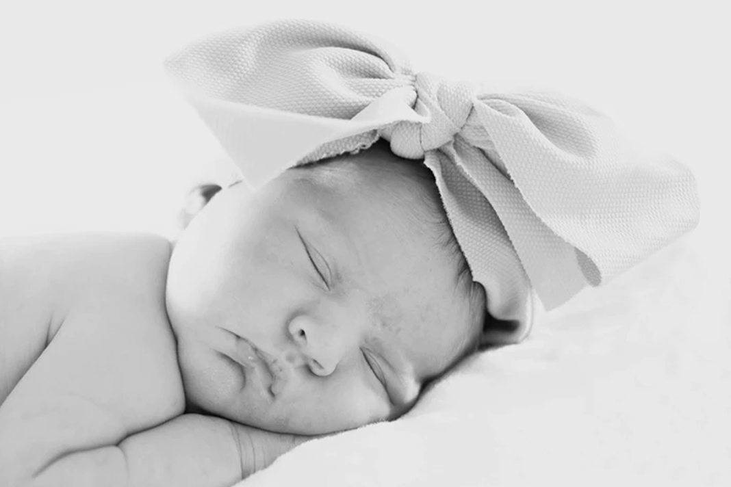half-of-scottish-teens-babies-aborted-in-2019 Baby Sleeping Black and White image