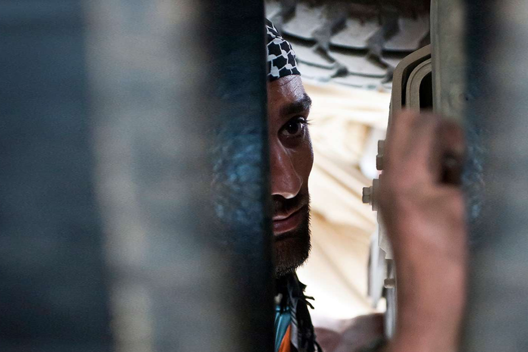 deep-in-hiding-afghan-christians-cling-to-faith An Afghan uniformed policeman