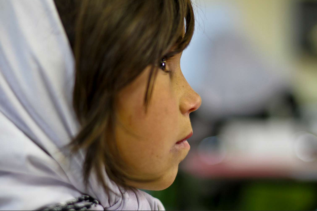 afghan-christian-girls-fear-being-abducted-as-taliban-brides A young Afghan girl listens intently to her teacher
