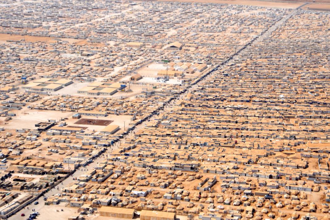 churches-in-the-middle-east-many-christians-continue-to-serve-among-the-refugees An Aerial View of the Za'atri Refugee Camp in Jordan, one of the most populated in the world. / U.S. Department of State, Wikimedia Commons, CCO.